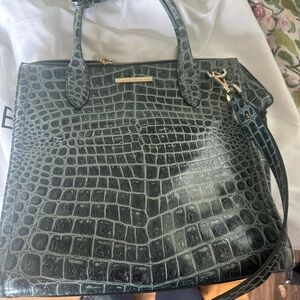 Brahmin green purse with strap. Excellent condition.